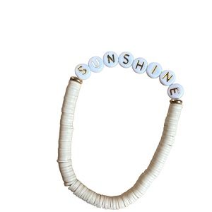 Neutral Heishi clay bead bracelet. BoHo positive vibe “sunshine” stretch cord.